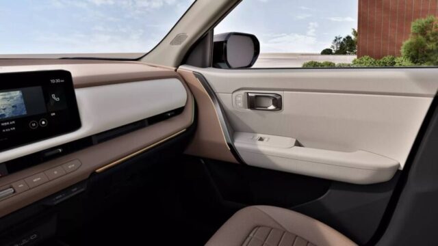 Kia Seltos 2027 interior detalhe porta