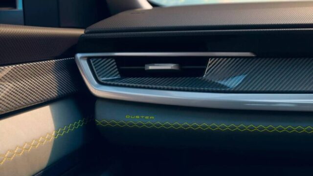Renault Duster 2027 interior detalhe painel