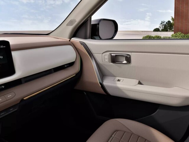 Kia Seltos 2027 interior detalhe porta Kia Seltos 2027 interior detalhe porta